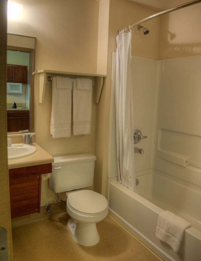 Woodspring Suites Topeka Quarto foto